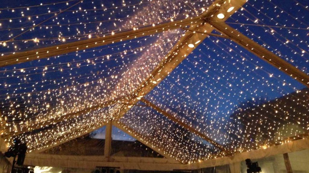sparkling fairy lights on pergola ceiling