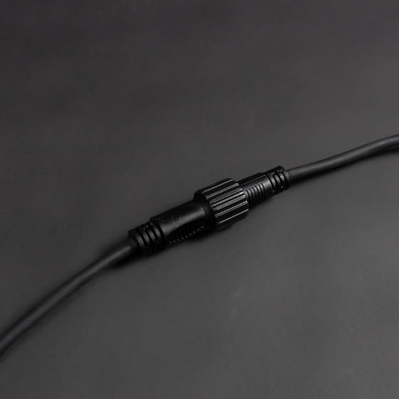 festoon belt connection piece on dark grey background