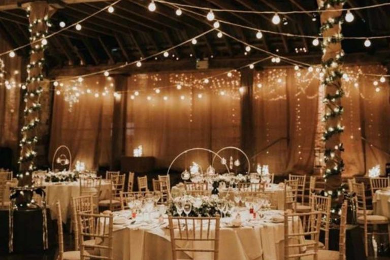 Stunning festoon lights illuminating a wedding.