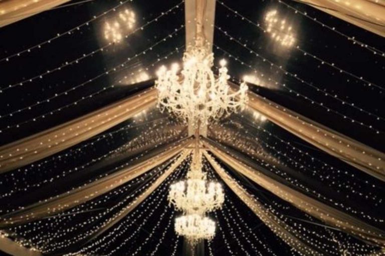 Stunning party lights illuminating a wedding.