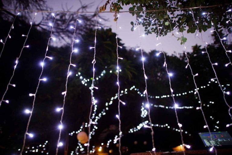 Sparkling fairy string lights lightening up a wedding.