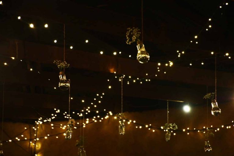 Sparkling fairy string lights lightening up a wedding.
