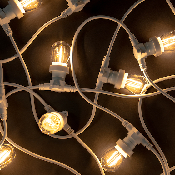 White Festoon Lights with 20 Bulbs per 10m and white cable on black background
